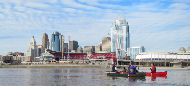 canoes and kayaks on Ohio River in front of Great American Ballpark, taken on annual New Year's Day paddle